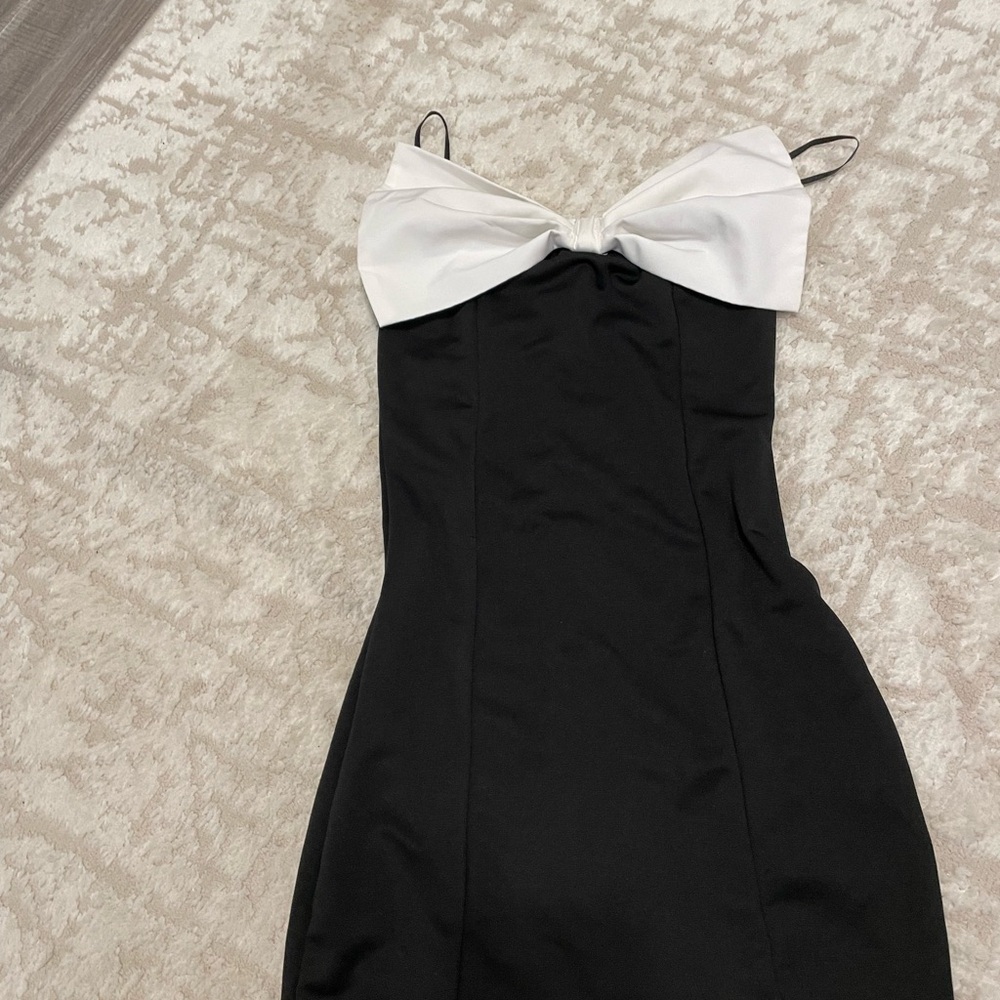 Elegant Black Dress with White Bow